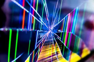 Broken led screen hit by a hammer, with many background colors while it is running.